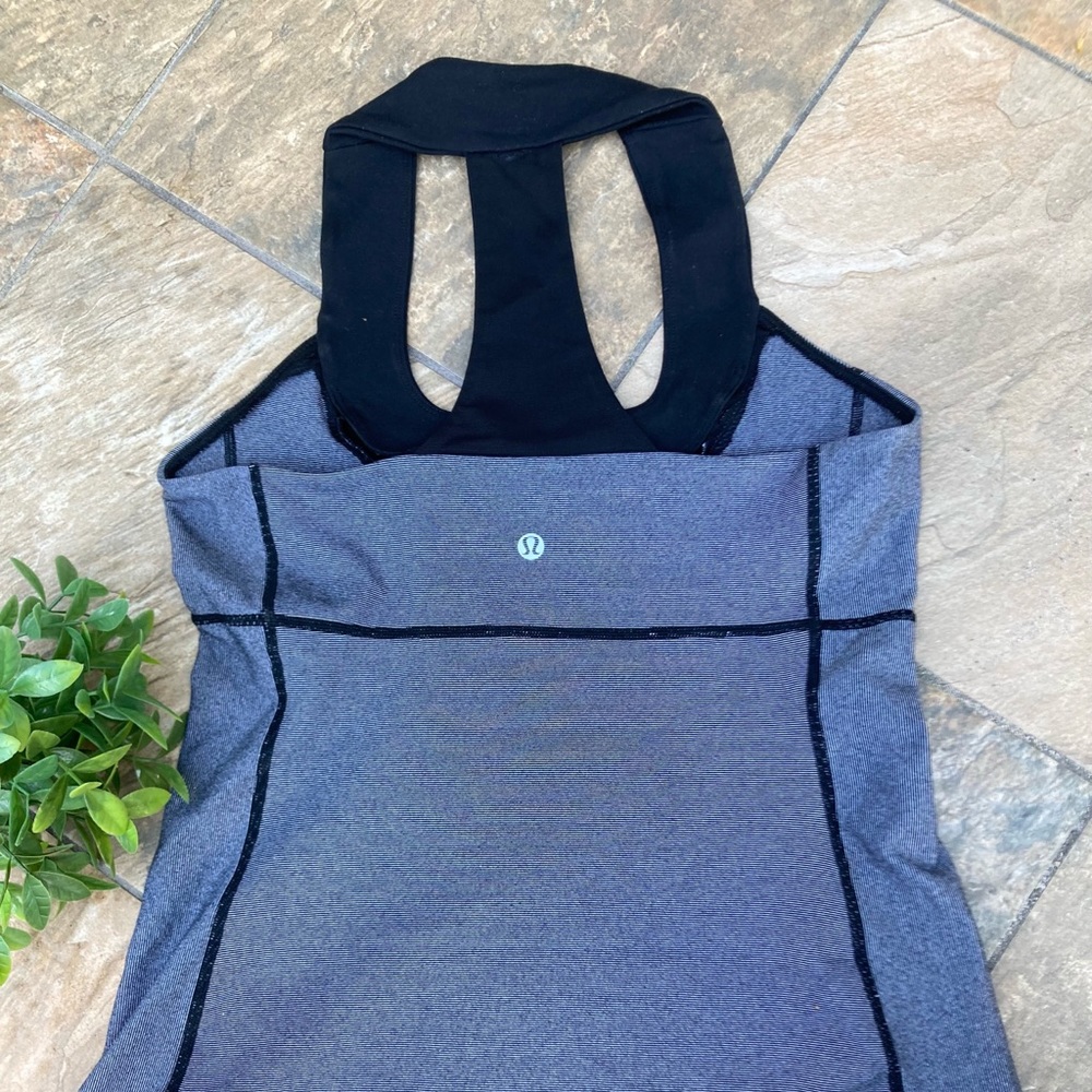 Lululemon tank top. Size 6-8 black/grey.